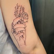 The most apparent meaning behind harry's handshake tattoo (which is located on the back of his left arm) is equality, which is obviously something that's important to the pop star. Anna On Twitter Harry Styles Tattoos Harry Tattoos Tattoos