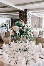 Your guests will be sitting at the table for most of the event. Pink White Centerpieces At Dreamy Country Club Wedding Lafayette Indiana Rubia Flower Market Florist Country Club Wedding White Centerpiece Wedding