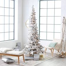 Narrow Flocked Austin Pine Pre Lit Slim Christmas Tree From Hayneedle Com Slim Christmas Tree Pencil Christmas Tree White Christmas Trees