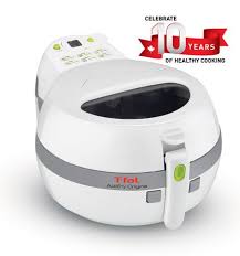 Using just a tablespoon or less of oil, the machine cooks to perfection a variety of menu items, from meats and seafoods to stir. T Fal Actifry Original 1kg Air Fryer With Timer Automatically Stirs White Walmart Canada