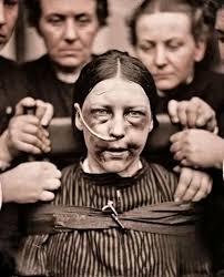 Suffragette Annie Kenney flashes a defiant smile during her London arrest  in April 1913. A former cotton mill worker turned Women's Social and  Political Union (WSPU) leader, Kenney faced three years in