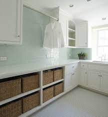 This 4x12 ceramic tile can lighten up any backsplash, or accent wall instantly with its crisp white color and subtle texture. Green Glass Subway Tiles Contemporary Laundry Room Kelly Deck Design