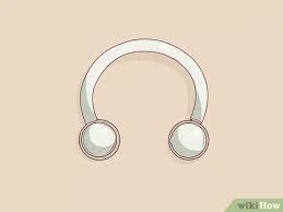 Once you have your clamps in place, you can tighten them and lock them. How To Pierce Your Septum With Pictures Wikihow