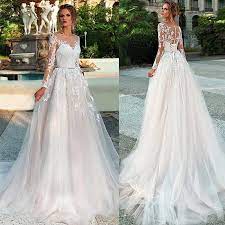 Many wedding gowns today have a zipper but a row of buttons is a stunning detail that will make your wedding dress more refined, with a touch of vintage and femininity, so beautiful! Long Sleeves Wedding Dress Illusion Lace Appliques With Belt Bridal Gowns Back Button And Lace Up Vestido De Noiva Wedding Gown Wedding Dresses Aliexpress