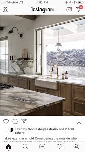All tile backsplashes can be shipped to you at home. Like The Marble And Wood Cabinets Modern Kitchen Design Home Kitchens Kitchen Inspirations