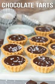 These Mini Salted Chocolate Tarts Are Super Easy With Only A Few Basic Ingredients Buttery Tender Shel In 2020 Chocolate Tart Chocolate Tarts Recipe Mini Tart Recipes