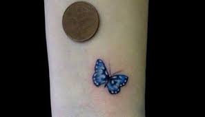 Tiny Blue Butterfly Tattoo Butterfly Simple Tattoos Simple Tattoos Momcanvas Blue Butterfly Tattoo Tattoos For Daughters Tiny Butterfly Tattoo