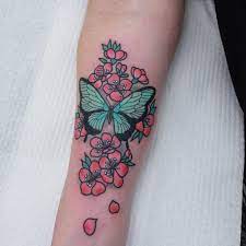Butterfly Tattoo Tattoo Ideas And Inspiration Traditional Butterfly Tattoo Tattoos Butterfly With Flowers Tattoo