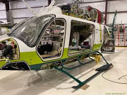 It has two large side doors and a folding rear clamshell doors to load ems patients or cargo, but can carry eight. Bell 429 Global Ranger Msn 57374