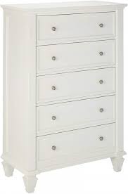 This poster bed has turned legs and ball finials. Coaster Sandy Beach Panel Bedroom Set In White