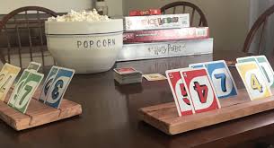 The playing card holder sits on the table in a semicircle may be cut from the center of the bottom of the wooden playing card holder to give it a different look and remove weight from the article. Diy Playing Card Holder Fun Happiness Life