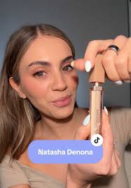 mad it took me so long to try this because I truly love this @Natasha  Denona hy glam concealer in shade YP3, swatching it on. What do you think?!  🤔 Blended out using the #leonebeauty by @RIKKI FEERRAR ...