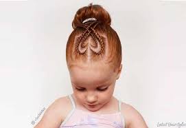 For a creative look make 4 rows with a double twist with side parting and fix it with elastic. 29 Cutest Hairstyles For Little Girls For Every Occasion
