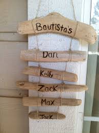 Front Door Hanger Made Of Driftwood From My Trip To Hawaii Used A Wood Burning Tool To Create The Names And Twine To Hold Wood Burning Tool Crafts Braid Shops