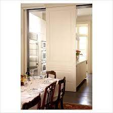 We've done sliding doors before, to close off rooms or make spaces a little bit more streamlined, but this was the first time we jumped into exploring a sliding. Gap Interiors Sliding Door Between Kitchen And Dining Room Picture Library Specialising In Interiors L Sliding Doors Sliding Doors Interior Doors Interior