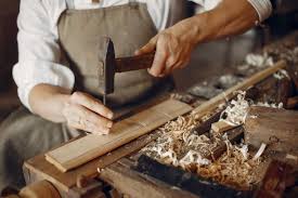Download Handsome Carpenter Working With A Wood For Free Carpenter Work Carpentry Services Wood