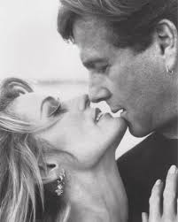 Farrah Fawcett and Ryan O'Neal. They had a turbulent relationship and there  were allegations of abuse