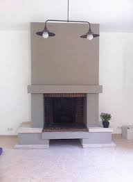 Comment Moderniser Une Vieille Cheminee Par Sarah Archi In Homify Moderniser Une Cheminee Cheminee En Brique Relooking Vieille Cheminee