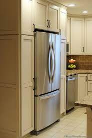 Tall Pantries Surround A Refrigerator Villagehomestores Com Beautiful Kitchen Cabinets Kitchen Pantry Design Small Kitchen Pantry