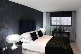 Black and white bedroom curtains ideas. How To Use Dark Curtains To Shape A Dramatic Cozy Interior
