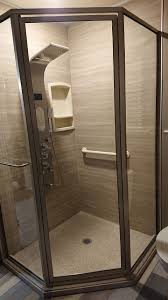 9 Faq S About Solid Surface Or Cultured Stone Shower Pans Stone Shower Shower Pan Granite Shower