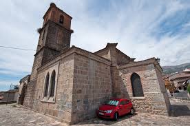With all private rooms circling the courtyard garden. La Iglesia De San Juan Bautista En Casavieja