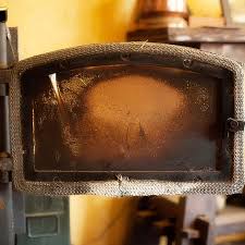 How To Clean The Glass Door Of A Wood Stove Hunker Fireplace Glass Doors Wood Stove Wood Burning Stove