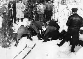 Investigators examining the Dyatlov Pass incident in snowy conditions