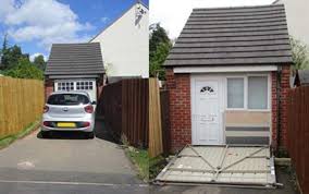 I have a 10' building line for the house and a 5' building line for the garage. Couple Caught Hiding Home Behind Fake Garage Door To Get Around Planning Laws The Independent The Independent