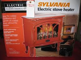 The electric fireplace heater features tempered safety glass on the front that is cool to the touch and conveniently operates with or without the heater. Sylvania Electric Stove Heater New In Box