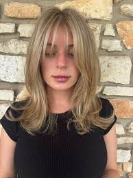 Who is a great hair stylist for coloring stubborn grey hair in Ringgold?