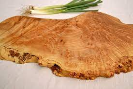 Natural acacia wood grain, brushed copper finishing, and a minimalistic circular shape give this board serious style. Hand Made Natural Cutting Boards Steamy Kitchen Recipes Giveaways