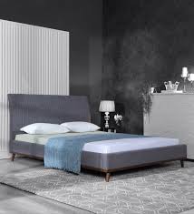 Deep textures and shades playing in this elegant and minimalist bedroom give a distinctive uniqueness. Buy Alonso Upholstered Queen Size Bed In Dark Grey Colour Casacraft By Pepperfry Online Queen Size Upholstered Beds Beds Furniture Pepperfry Product