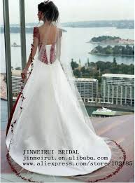 Pin By Mary Beth Ellison On New Dishes Red Wedding Dresses Wedding Dress Cap Sleeves Red White Wedding Dress