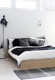 Shades of black, gray, and blue are often found in modern men's bedrooms. Sophisticated Bedroom Colors For Men Sophisticated Bedroom Modern Bedroom Design New Bedroom Design