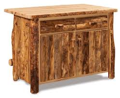 It also features useful storage with two towel racks, three drawers for utensils and accessories, an inner cabinet with colorful slate tiles and storage inside, and two spacious open shelves. Rustic Aspen Wood Kitchen Island From Dutchcrafters Amish Furniture