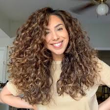 Flat wrap hair with a curling iron lazy curl with a curling iron spiral curls with a flat iron red carpet waves with a curling iron ribbon curl with a flat iron push waves with a flat iron there are many hair tutorials out there that show you how to curl hair. 28 Cute Long Curly Hairstyles For 2021 Easy Curly Hair Ideas