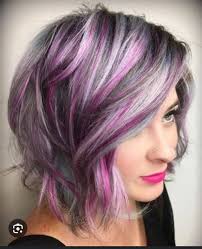 Who is a good hair stylist in Lockport for vivid hair colors?