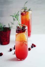Champagne, ginger beer, cranberry juice, and ruby red grapefruit juice. Cranberry Rosemary Champagne Cocktails Parsnips And Pastries