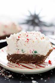Layers Of Jell O Chocolate Pudding Creamy Cream Cheese Filling And Crushed Peppermint Candies Make This No Candy Cane Pie Holiday Desserts Candy Cane Dessert