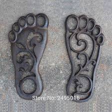 Do you have a large lawn i'm talking about creating a few diy stepping stones that will not only create a pathway through your. Set Of 2 Bare Foot Cast Iron Footprint Stepping Stone Garden Yard Art Decor Plaques Signs Aliexpress