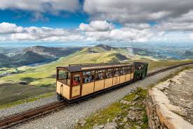 The Snowdon Mountain Railway Is The Most Thrilling Train Ride In Europe Wales Travel Snowdonia National Park National Parks