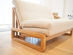 They look like a backward letter 'z.' they are designed to save up on space as they use thin mattresses so that they can be folded to thirds. Futon Company Solid Oak Double Sofabed Trifold Ultimate Mattress Cushions Rrp 944 Village