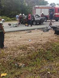 Cropped view of businessman and businesswoman holding compensation claim form and pencil at workplace. Findwitness Malaysia Fatal Accident Findwitness Singapore Traffic Workplace Accidents Facebook