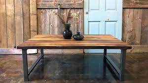 Natural teak coffee table with cast iron legs. 7 Gorgeous Sustainable Eco Friendly Tables To Gather Around