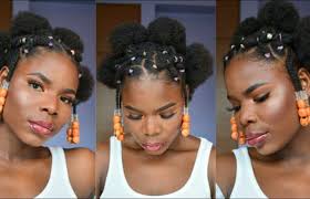 With this rubber band hairstyle, you can show off your natural, curly texture while keeping your hair out of your face. Criss Cross Rubber Band Method On Short Natural Hair