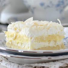 Low Carb Coconut Cream Layered Dessert Coconut Cream Delight Is A Pie In Bar Form A Cookie Crust Cream Low Carb Chocolate Low Carb Cake Sugar Free Desserts