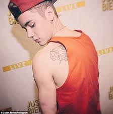 Justin Bieber Shows Off Two More Tattoos In Stockholm Bringing His Body Art Collection Up To 14 Daily Mail Online