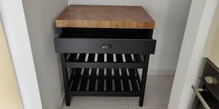 With shelves beneath the tabletop, you'll be able to hide much of your storage: Ikea Vadholma Mini Kitchen Island Furniture Home Living Bathroom Kitchen Fixtures On Carousell
