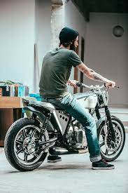 Yamaha Xs 400 By Kruz Company Rear With Rider Cafe Racer Motorcycle Cafe Racer Bikes Cafe Racer